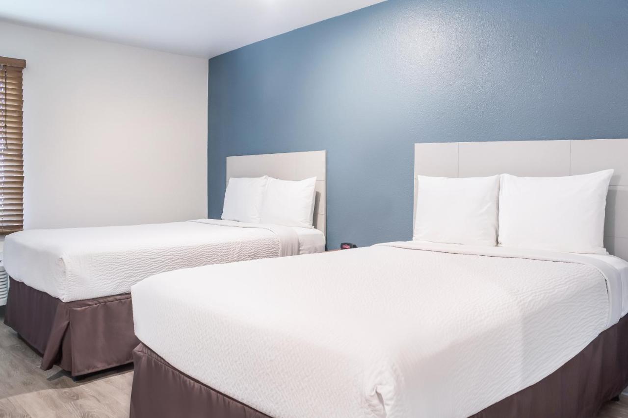 Woodspring Suites Conroe Buitenkant foto
