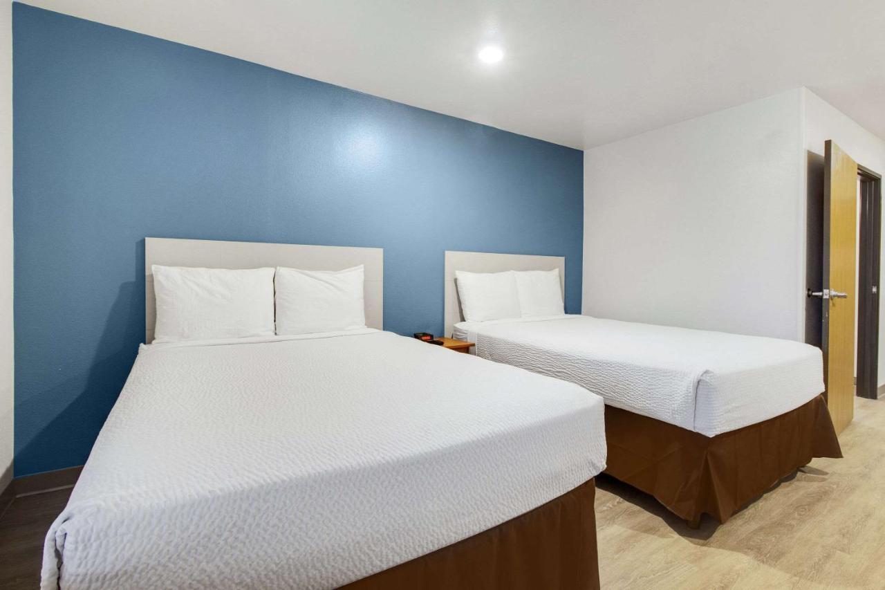 Woodspring Suites Conroe Buitenkant foto