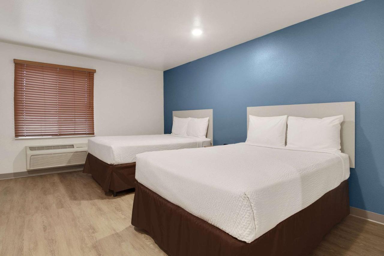 Woodspring Suites Conroe Buitenkant foto