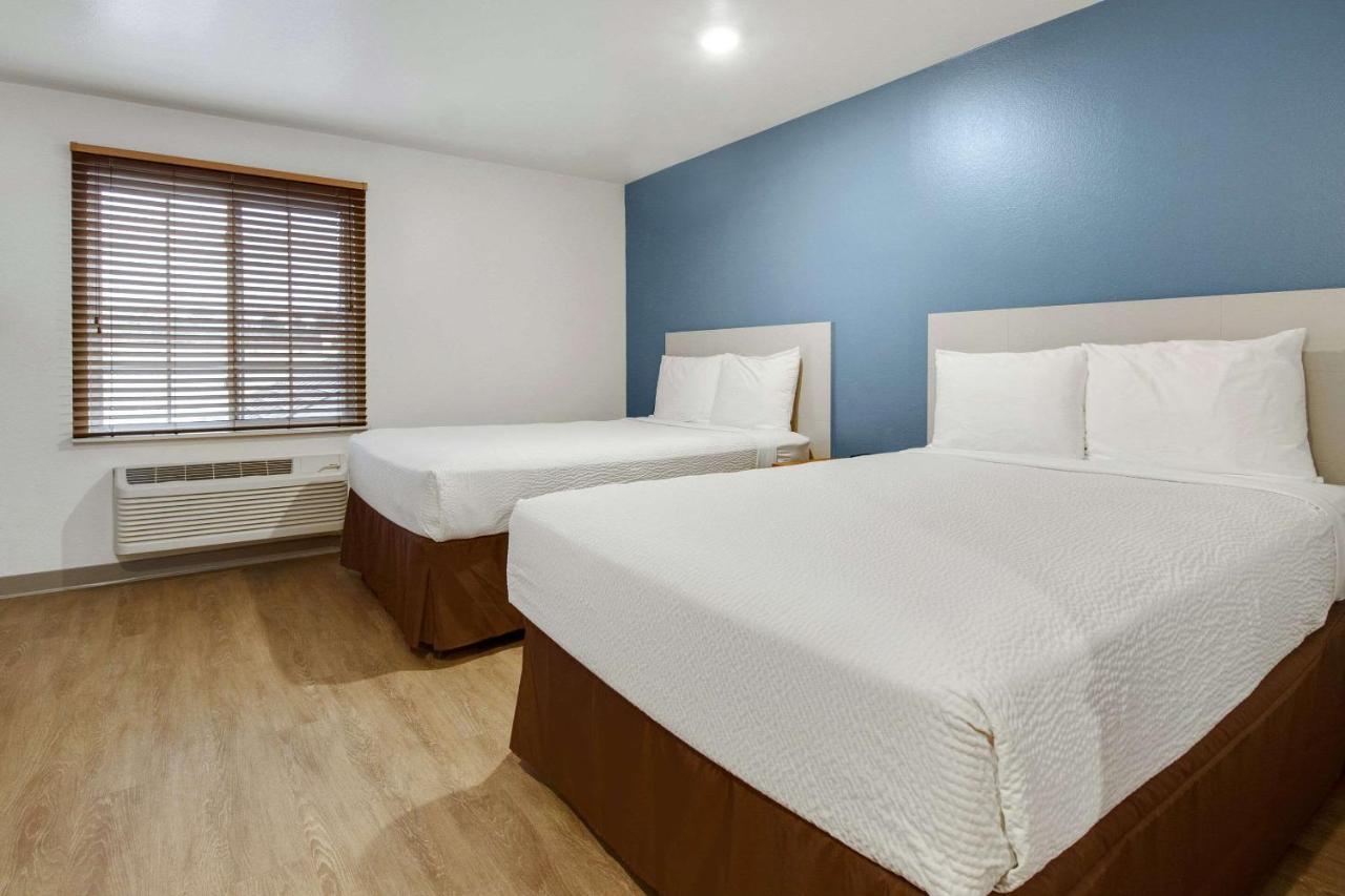Woodspring Suites Conroe Buitenkant foto